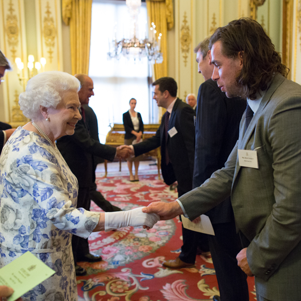 Ross shaking hands with queen